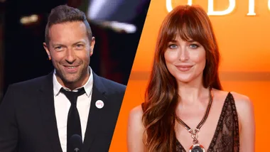 A man wearing a suit and a brunette woman smiling