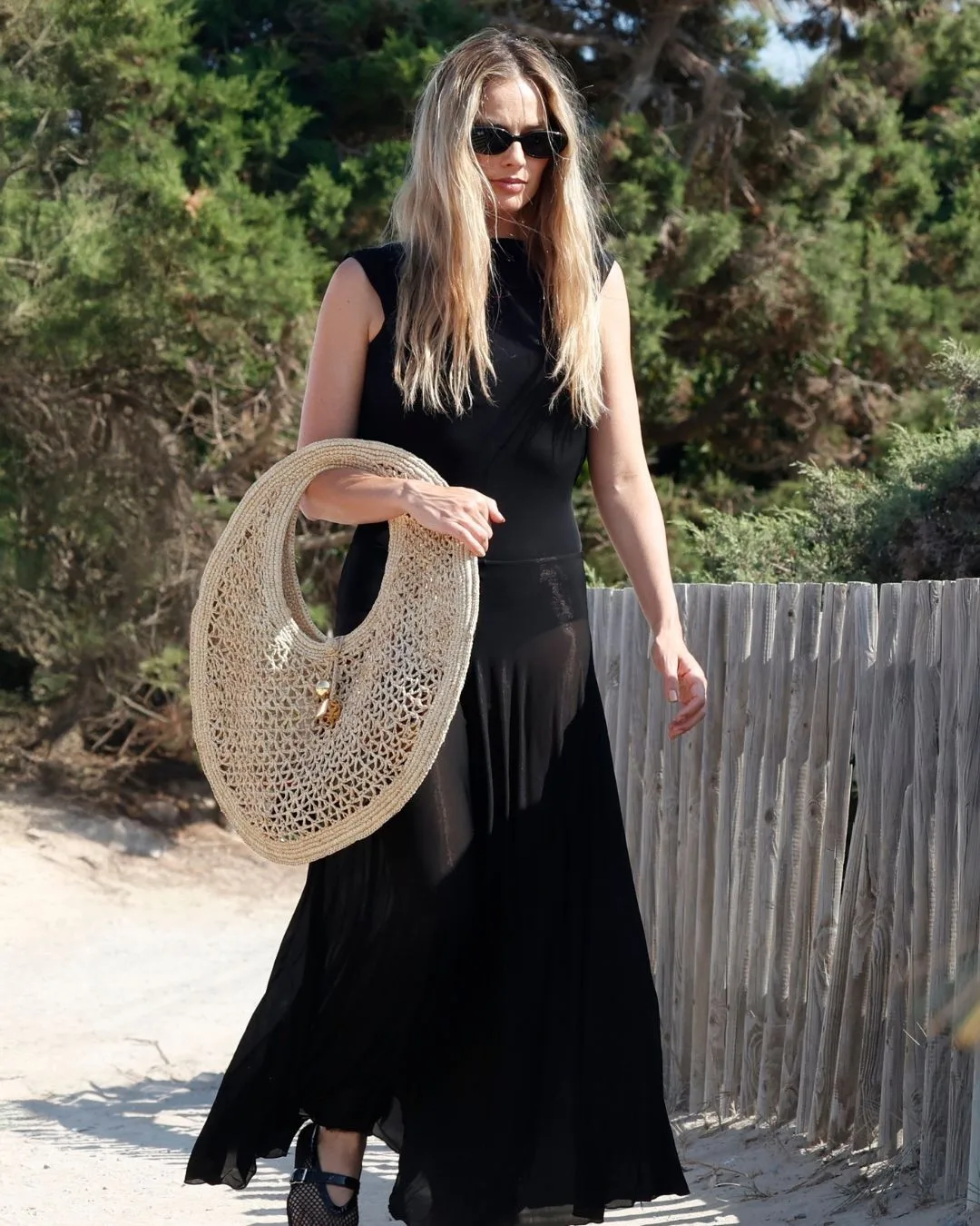Margot Robbie in black sheer dress