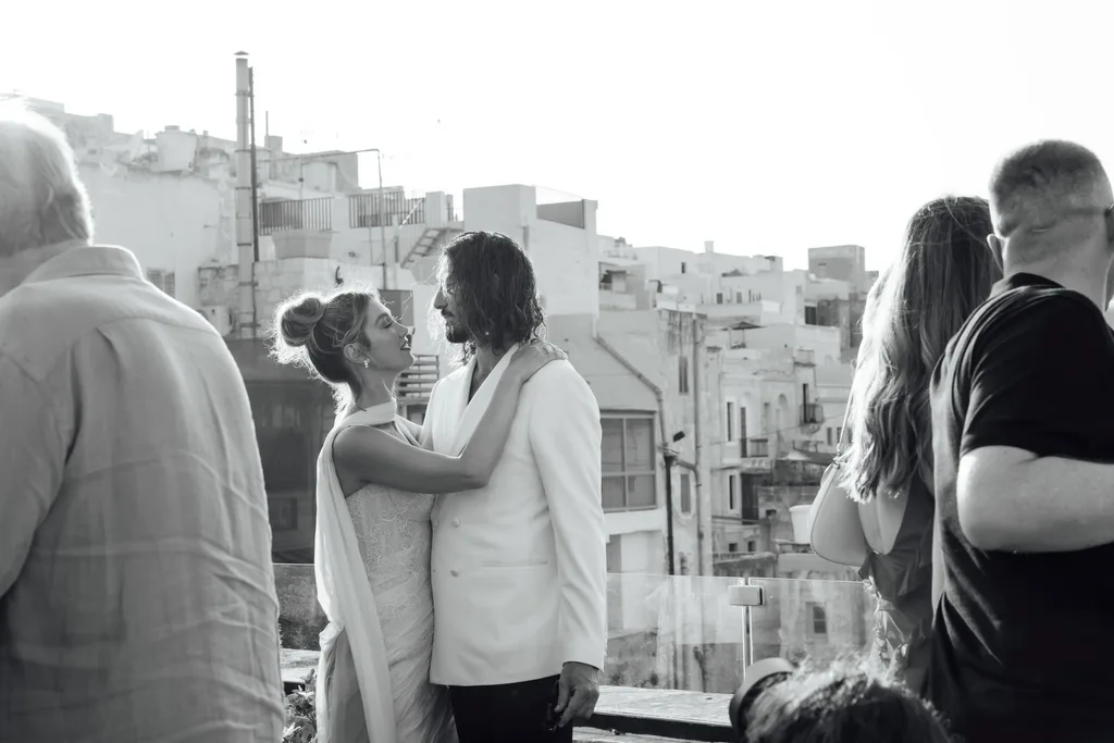 Music icon Delta Goodrem with husband Matthew Copley in Malta