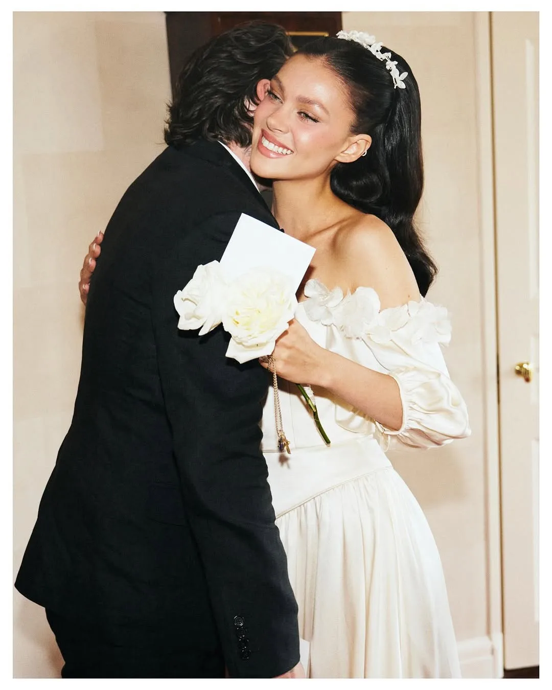 nicola hugs brooklyn beckham on the day of their second wedding