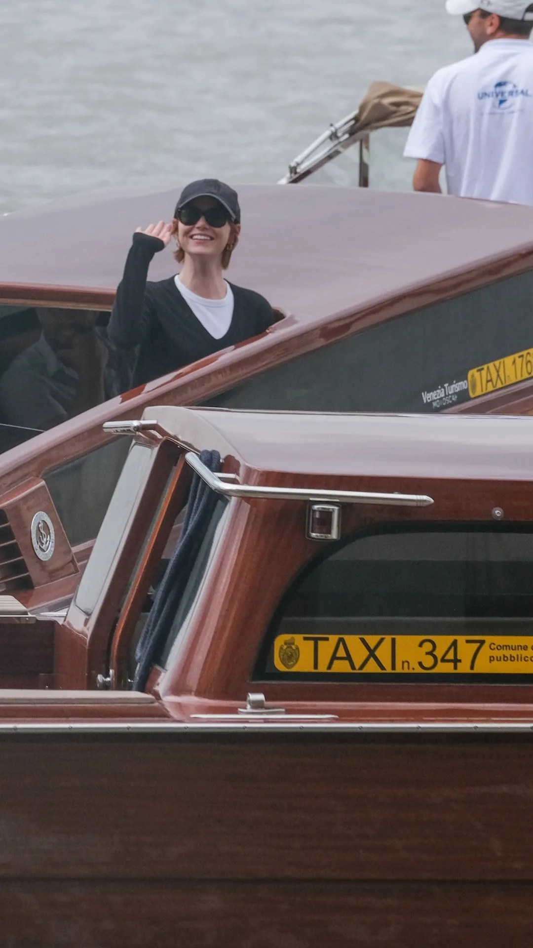 Emma Stone arriving by water taxi to the 2025 Venice Film Festival.