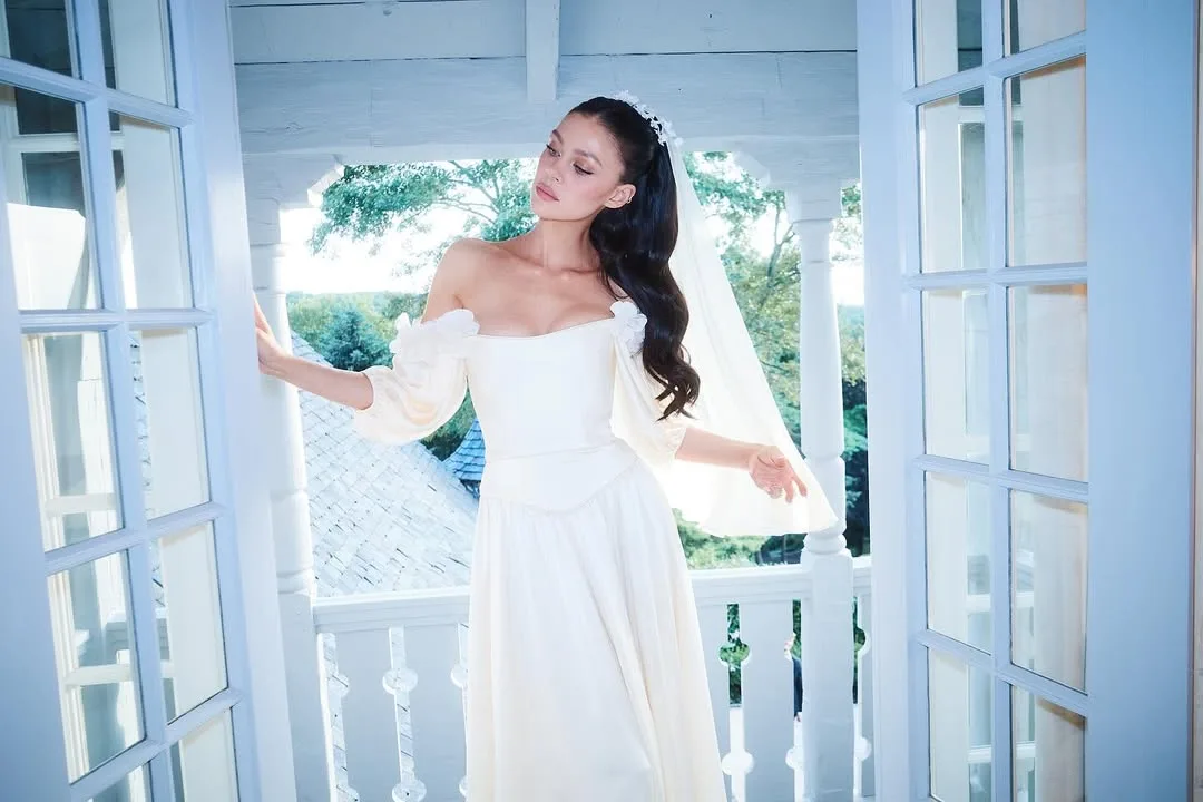 nicola peltz beckham poses in her second wedding dress