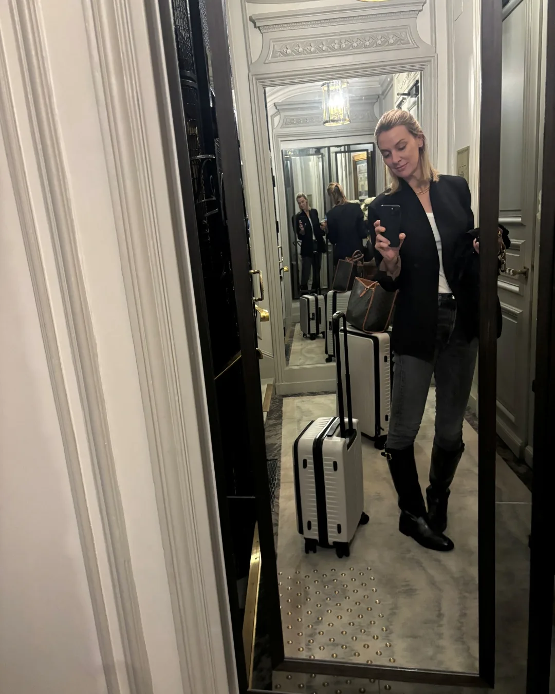 Marie Claire editor Georgie McCourt carrying Nere luggage