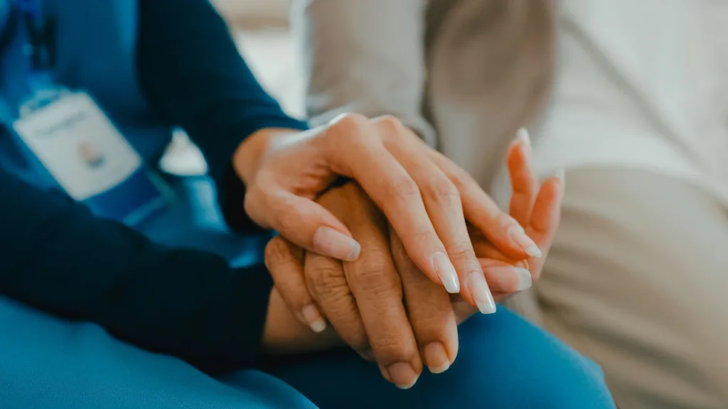 Carer with elderly person