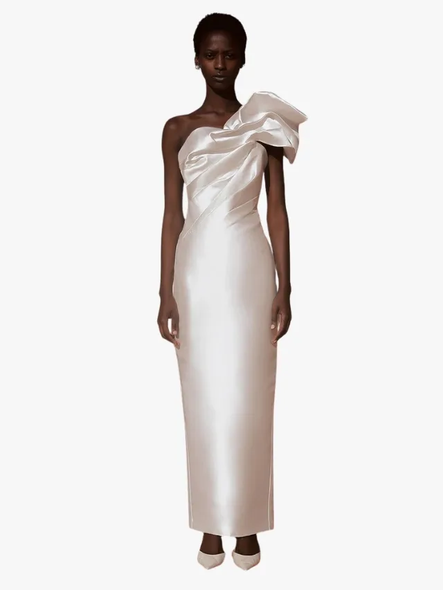 A white silk affordable wedding dress with gathered sculptural single sleeve