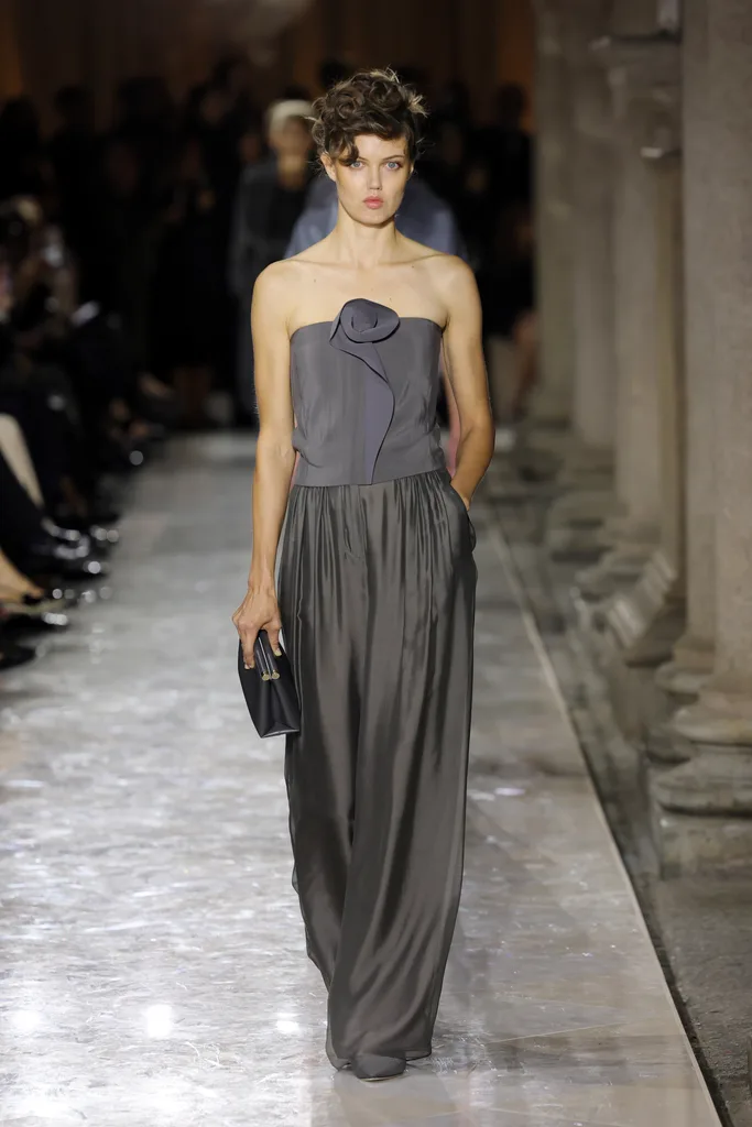 MILAN, ITALY - SEPTEMBER 28: A model walks the runway at the Giorgio Armani fashion show during the Milan Womenswear Spring/Summer 2026 on September 28, 2025 in Milan, Italy. (Photo by Vittorio Zunino Celotto/Getty Images)