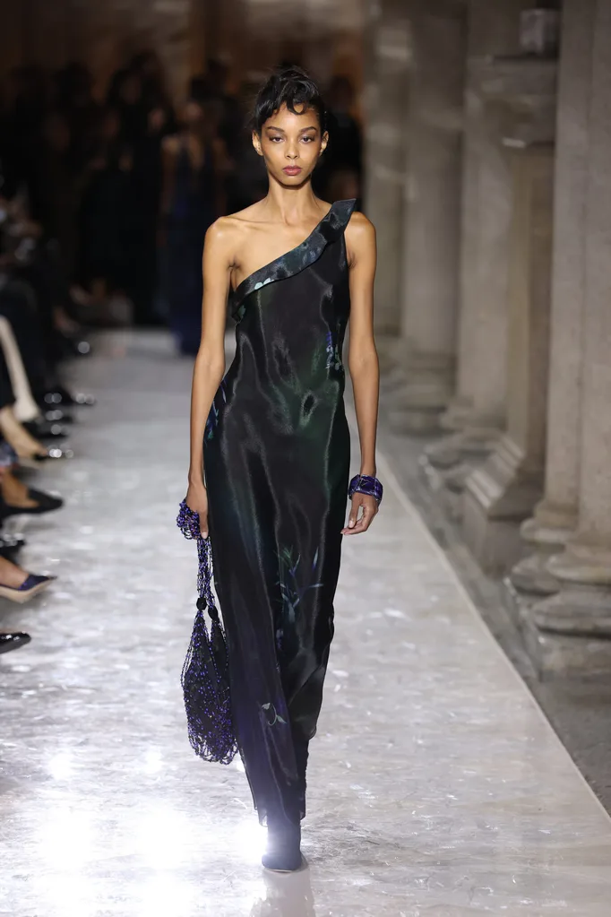 MILAN, ITALY - SEPTEMBER 28: A model walks the runway at the Giorgio Armani fashion show during the Milan Womenswear Spring/Summer 2026 on September 28, 2025 in Milan, Italy. (Photo by Daniele Venturelli/WireImage)