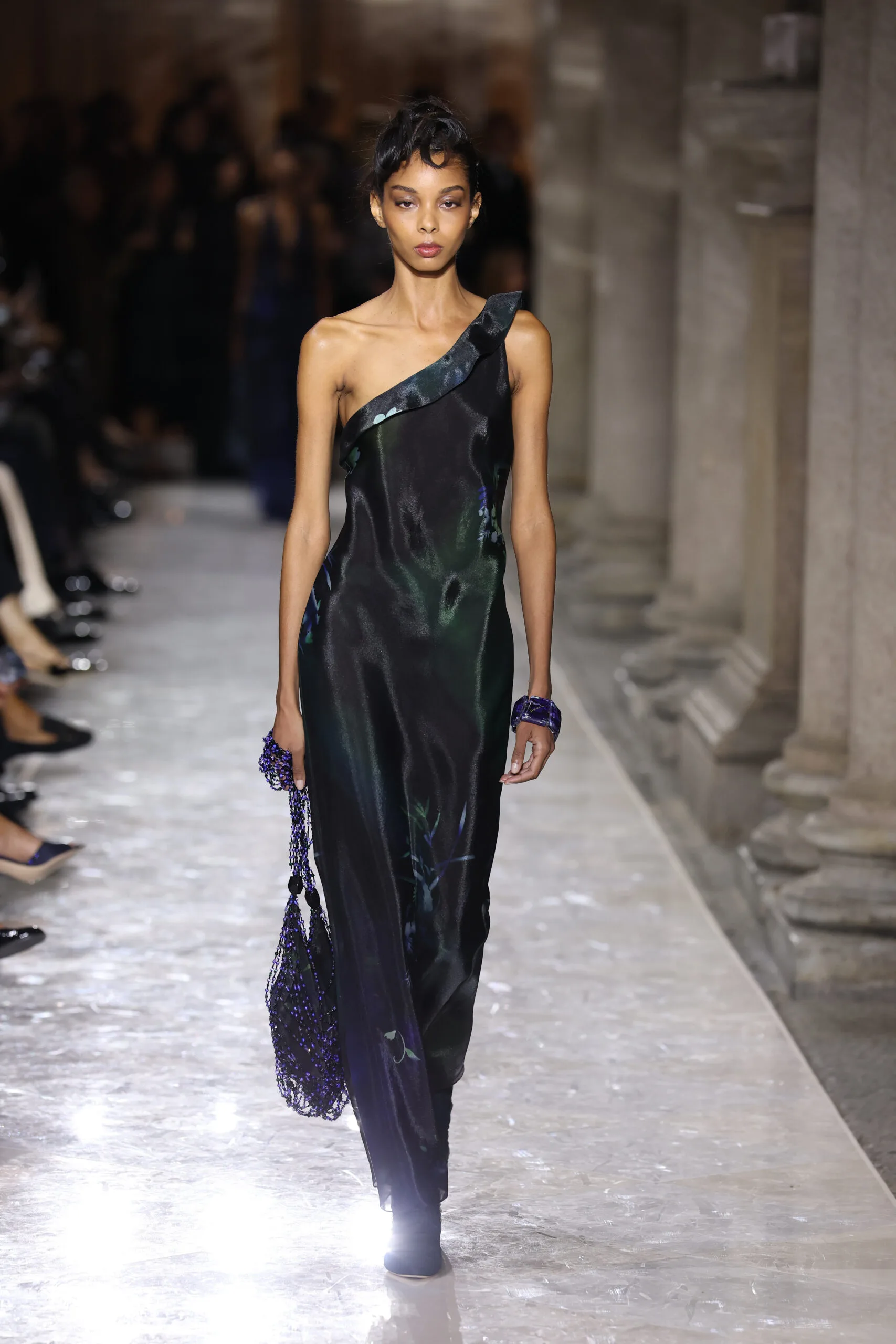 MILAN, ITALY - SEPTEMBER 28: A model walks the runway at the Giorgio Armani fashion show during the Milan Womenswear Spring/Summer 2026 on September 28, 2025 in Milan, Italy. (Photo by Daniele Venturelli/WireImage)