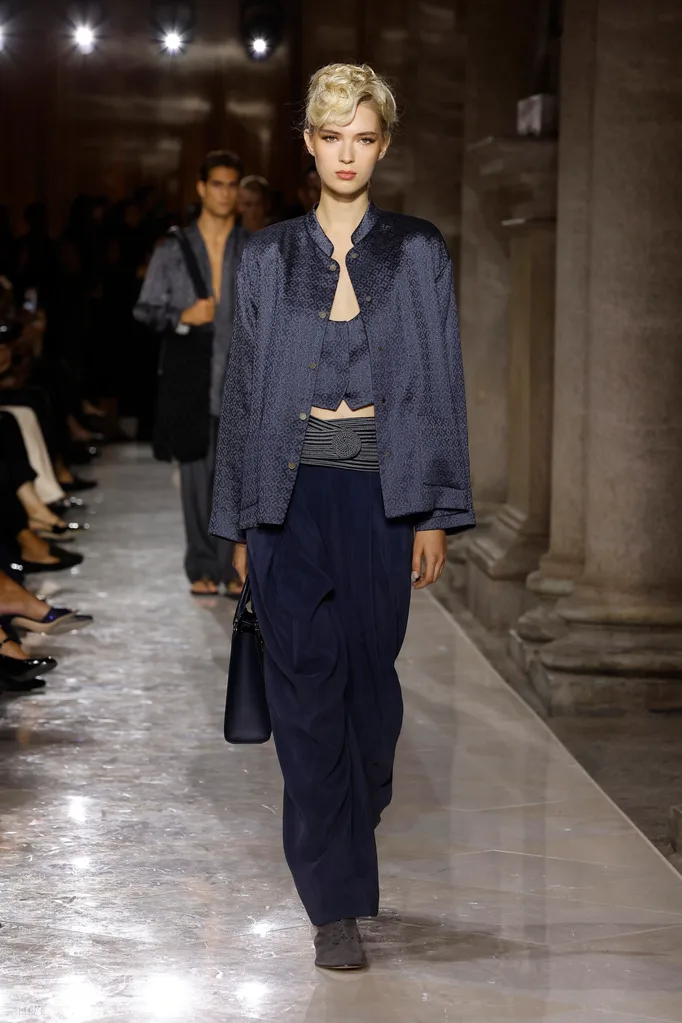 MILAN, ITALY - SEPTEMBER 28: A model walks the runway at the Giorgio Armani fashion show during the Milan Womenswear Spring/Summer 2026 on September 28, 2025 in Milan, Italy. (Photo by Estrop/Getty Images)