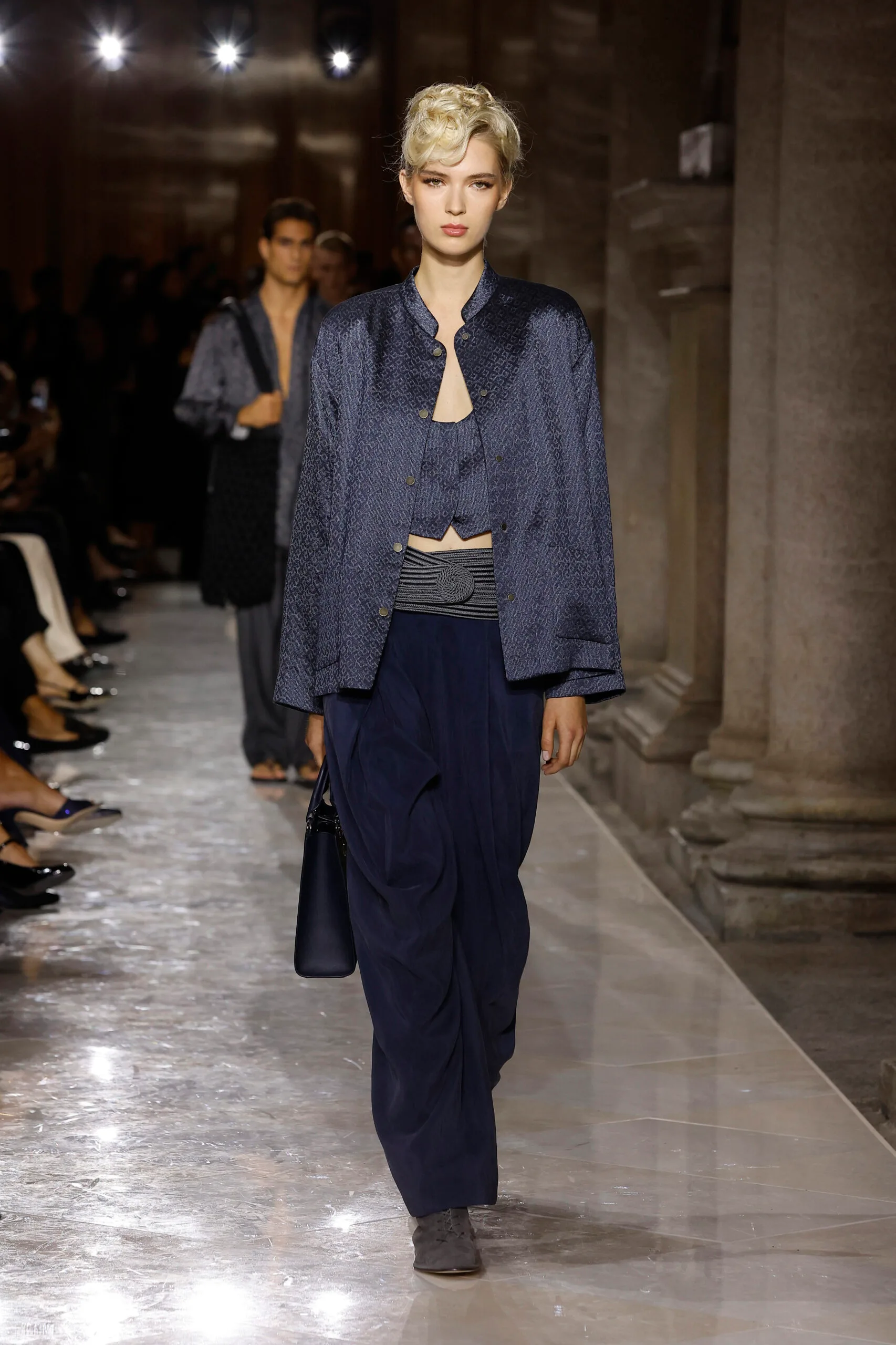 MILAN, ITALY - SEPTEMBER 28: A model walks the runway at the Giorgio Armani fashion show during the Milan Womenswear Spring/Summer 2026 on September 28, 2025 in Milan, Italy. (Photo by Estrop/Getty Images)