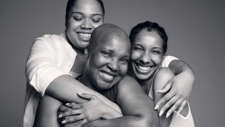 three women hugging