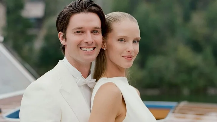 Abby champion and Patrick Schwarzenegger smile to camera