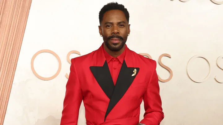 Colman Domingo in a red blazer at the Oscars