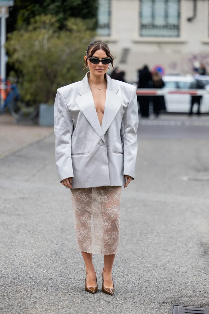 girl wears sheer lace skirt with blazer