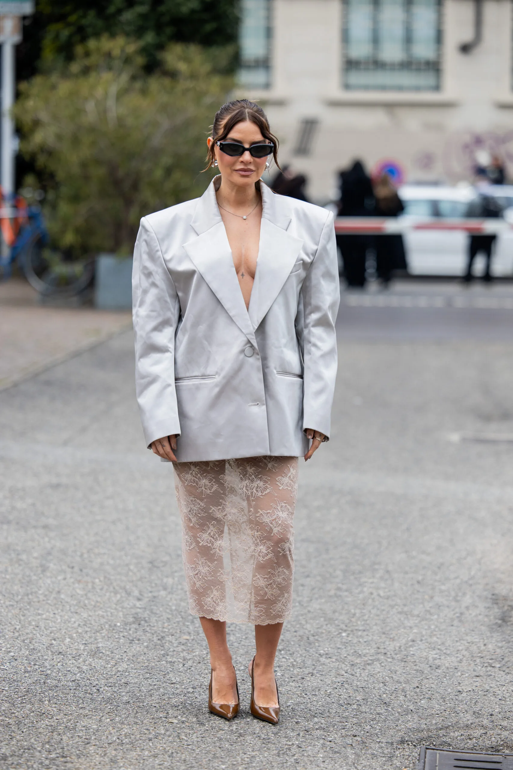 girl wears sheer lace skirt with blazer 