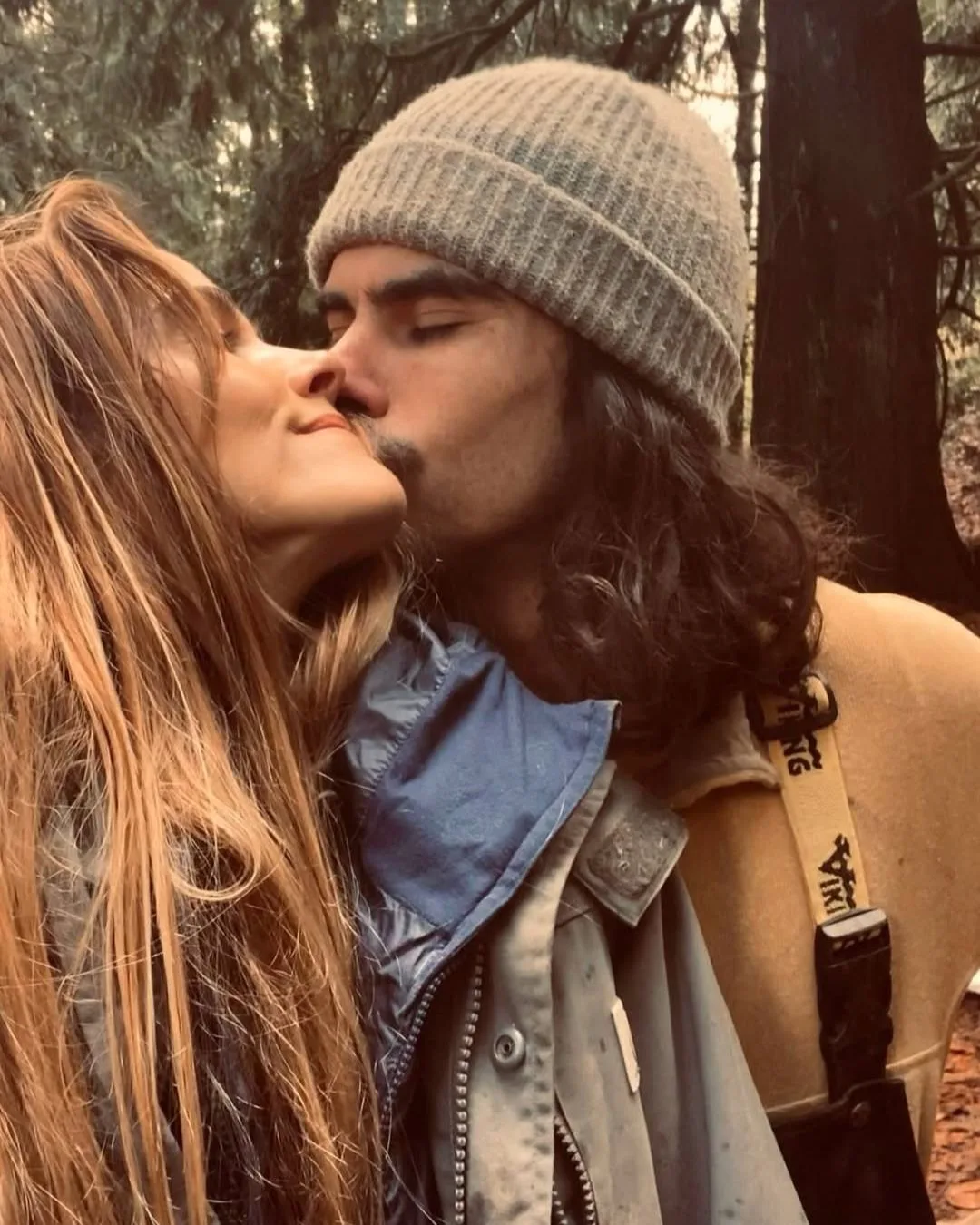 Isabel lucas receives a kiss from partner Cyrus Sutton