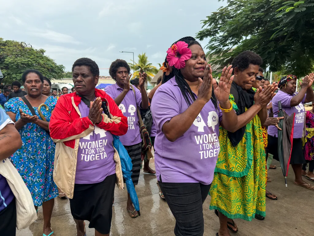 WITTT and WITTT Sunshine members march in Port Vila on World Humanitarian Day, led by Flora Vano (Country Manager, ActionAid Vanuatu).