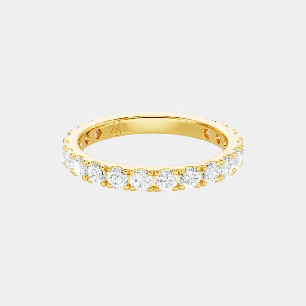 Unique engagement ring eternity band with pave diamonds by Heirest