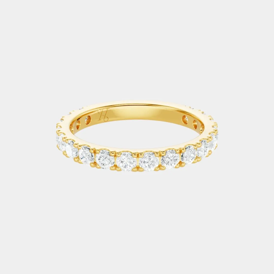 Unique engagement ring eternity band with pave diamonds by Heirest