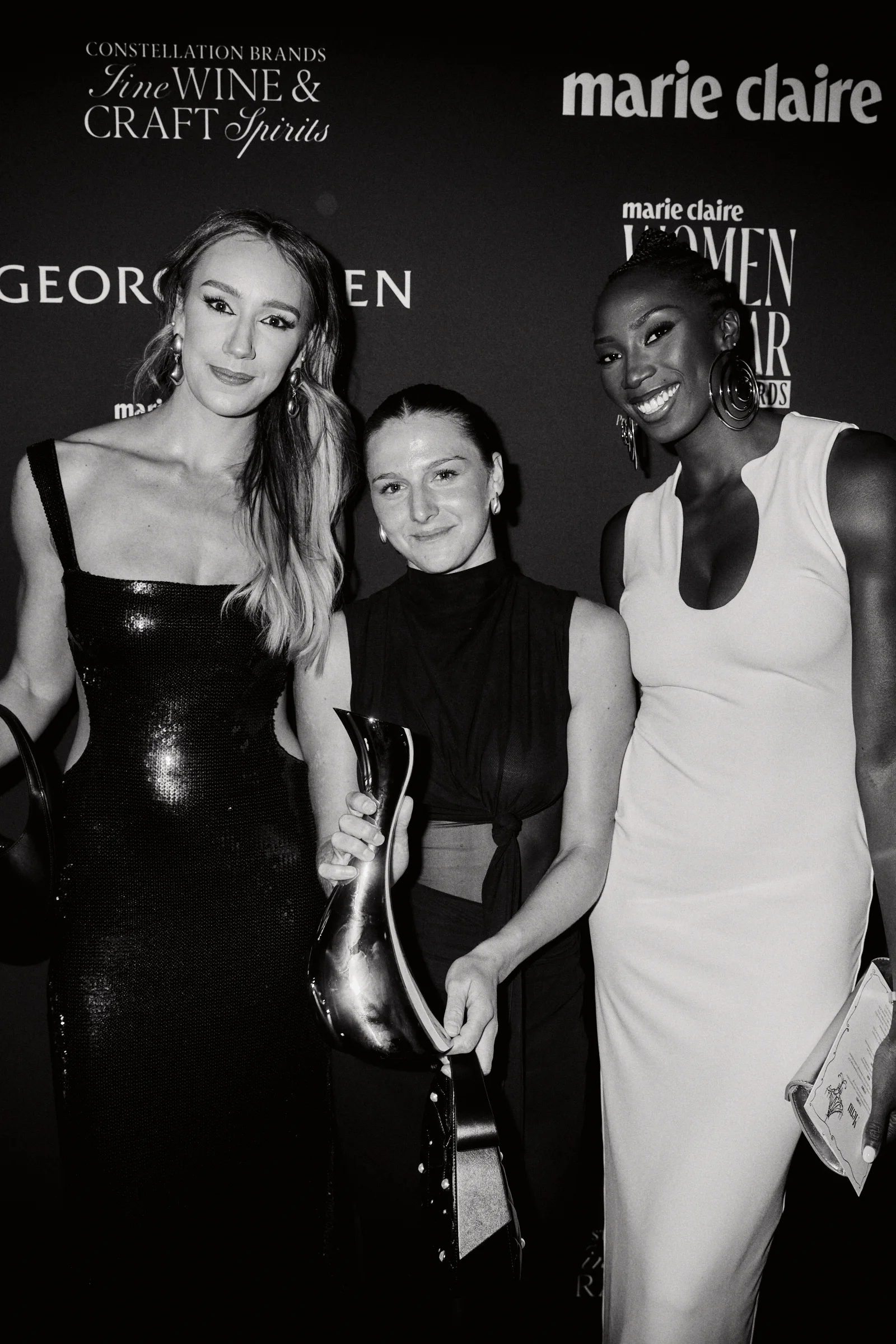 Molly Picklum with Ezi Magbegor and Alanna Smith.