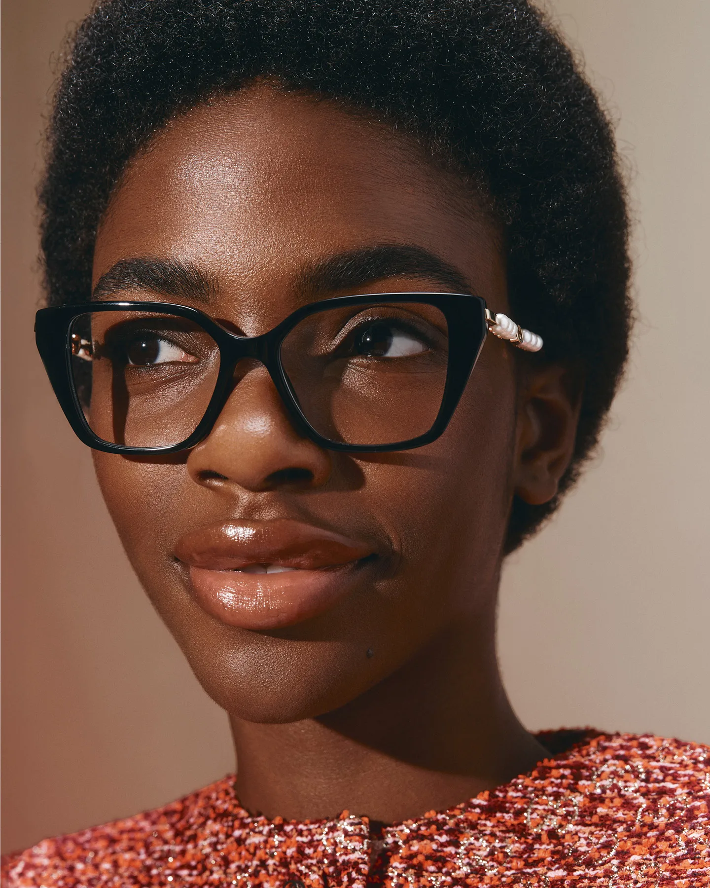 Gucci glasses, $895, and jacket, $5200.