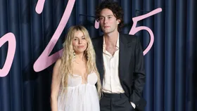 Sienna Miller Debuts Baby Bump In Sheer Givenchy Gown At 2025 Fashion Awards