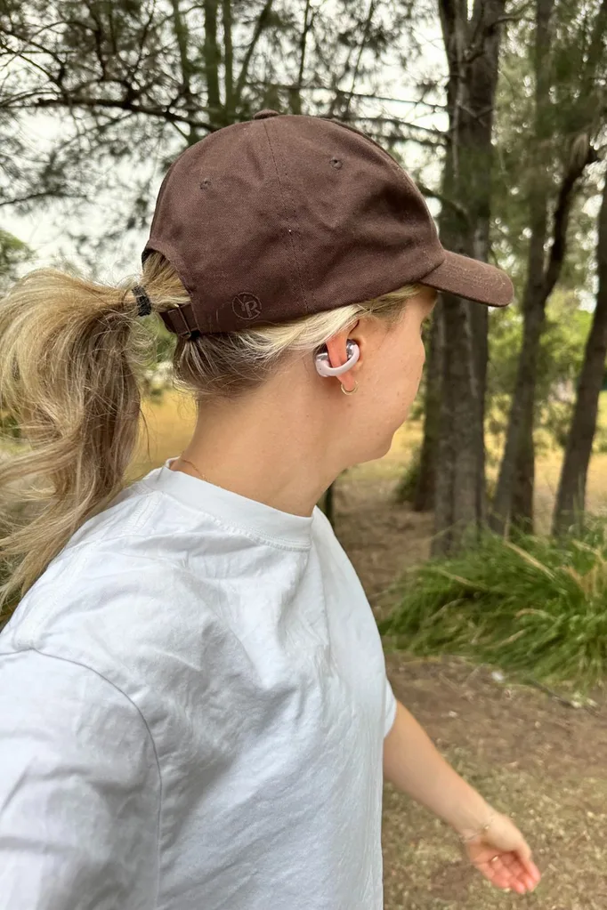 Wearing OpenDots One earbuds in pink