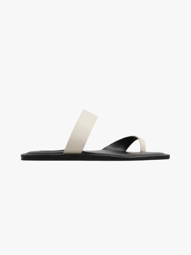 A Emery The Kasper Sandal in Bone and Black leather