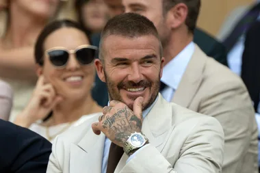Sir David Beckham watches on during the Gentlemen's Singles first round match between Fabio Fognini of Italy