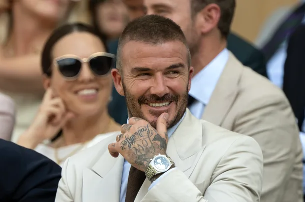 Sir David Beckham watches on during the Gentlemen's Singles first round match between Fabio Fognini of Italy