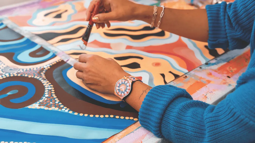Indigenous artist Bayley Mifsud with her landmark Swatch design