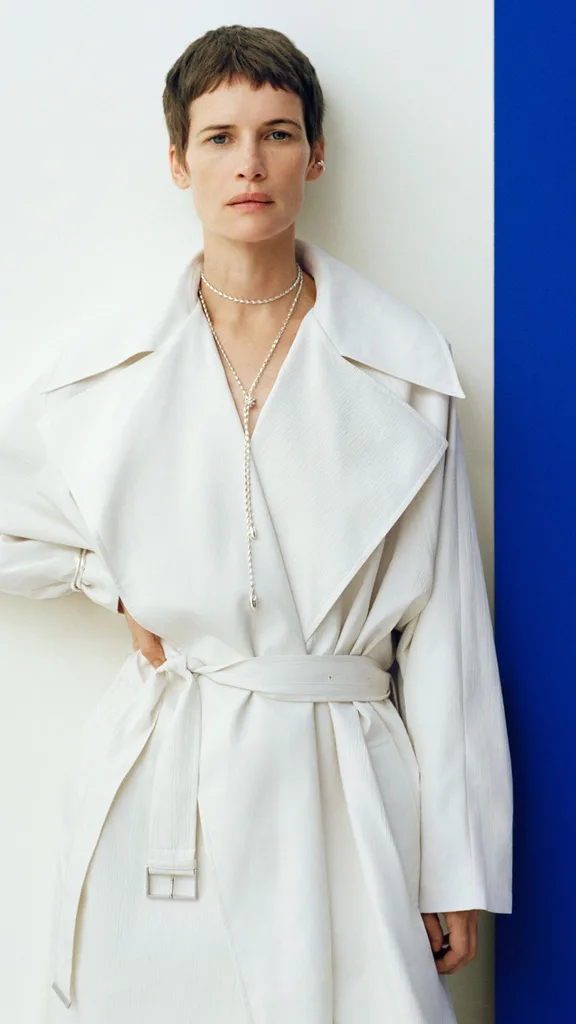 Georg Jensen reflect necklace worn on model wearing white coat