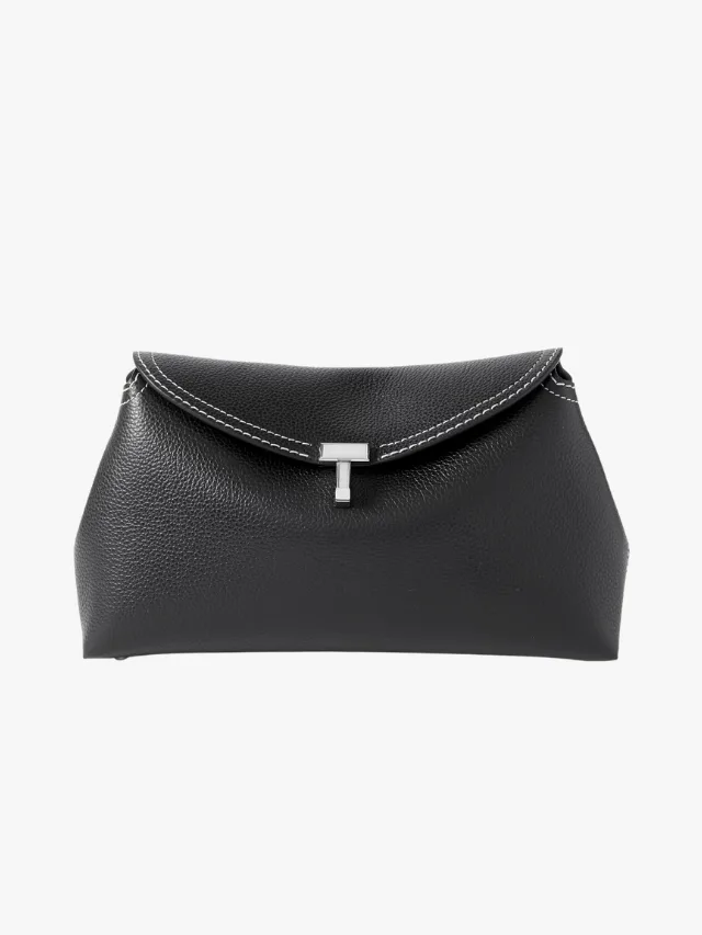 Best Day To Night Convertible Handbags For Your Capsule Wardrobe_Toteme T-Lock Leather Clutch_marie claire