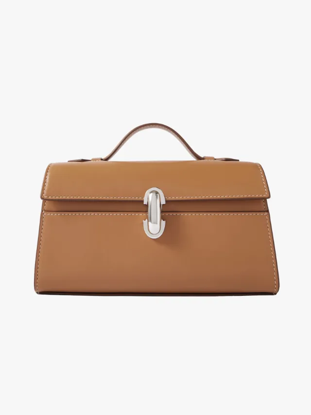 The Most Adaptable Designer Silhouettes_The Boxy Top-Handler_SAVETTE
Symmetry Pochette Leather Tote_marie claire
