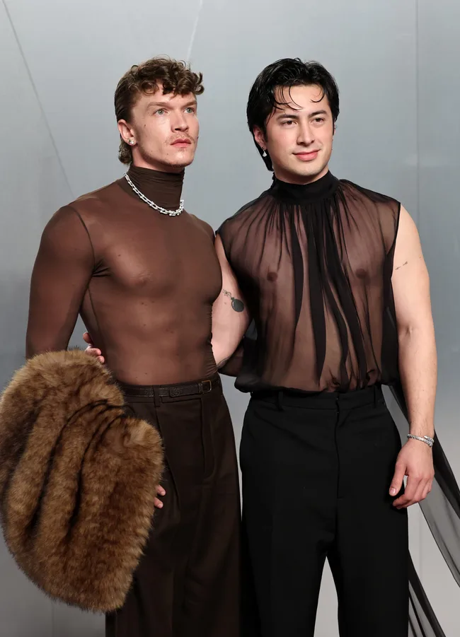 LOS ANGELES, CALIFORNIA - MARCH 15: (L-R) Connor Storrie and Hudson Williams attend the 2026 Vanity Fair Oscar Party Hosted By Mark Guiducci at Los Angeles County Museum of Art on March 15, 2026 in Los Angeles, California. (Photo by Jamie McCarthy/WireImage)