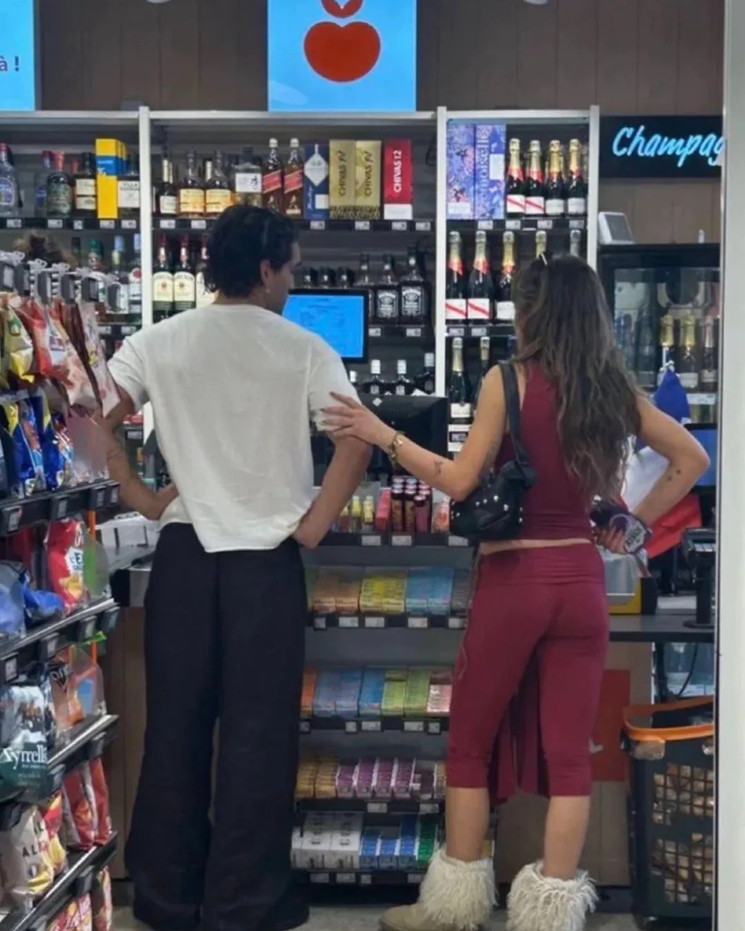 A photo of Josh heuston and Mika Abdalla at a convenience store in Paris