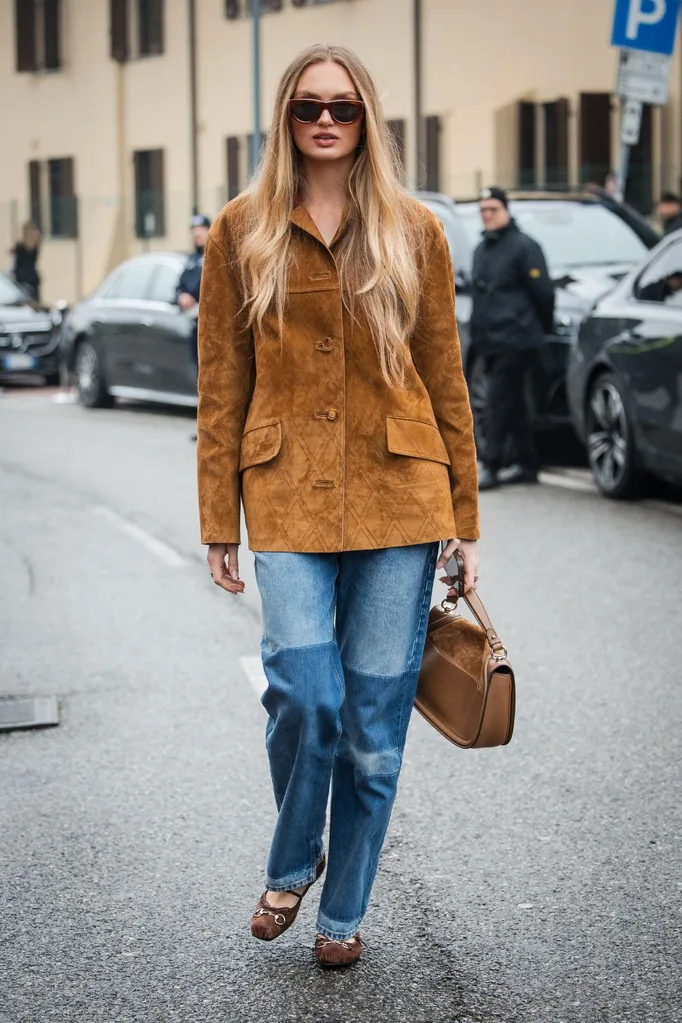 Romee Strijd wearing brown suede jacket and jeans Street style