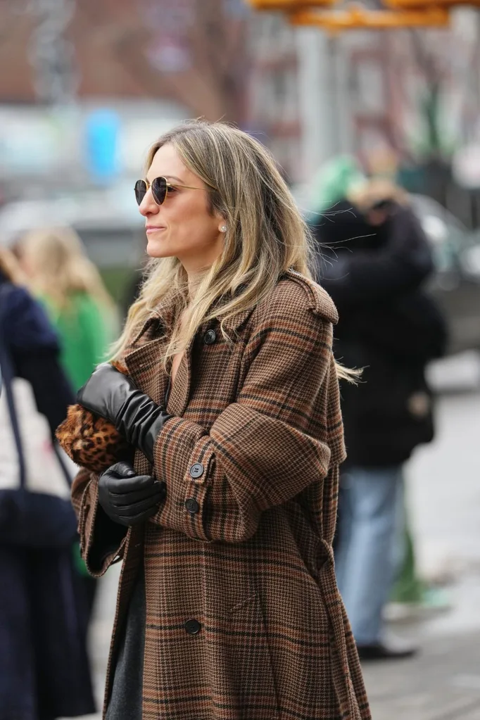 Woman in brown coat and gloves street style