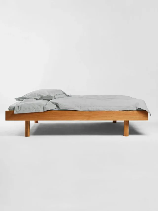 studio sutram bed with grey-green colour sheets