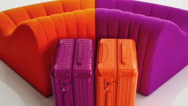 Rimowa’s New Orange and Magenta Collection Is Bringing Bold Colour Back To Travel