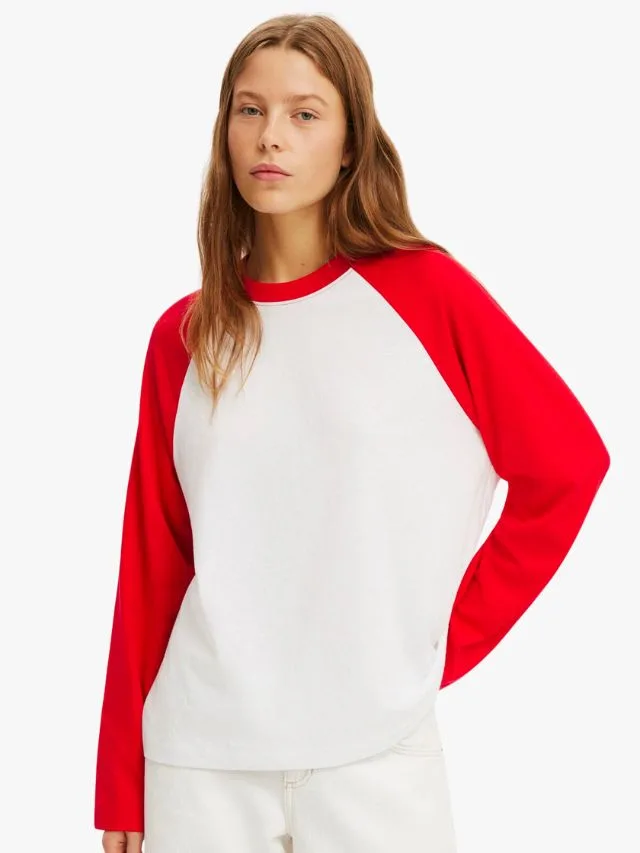 Cotton on raglan long sleeve top with red sleeves and white torso