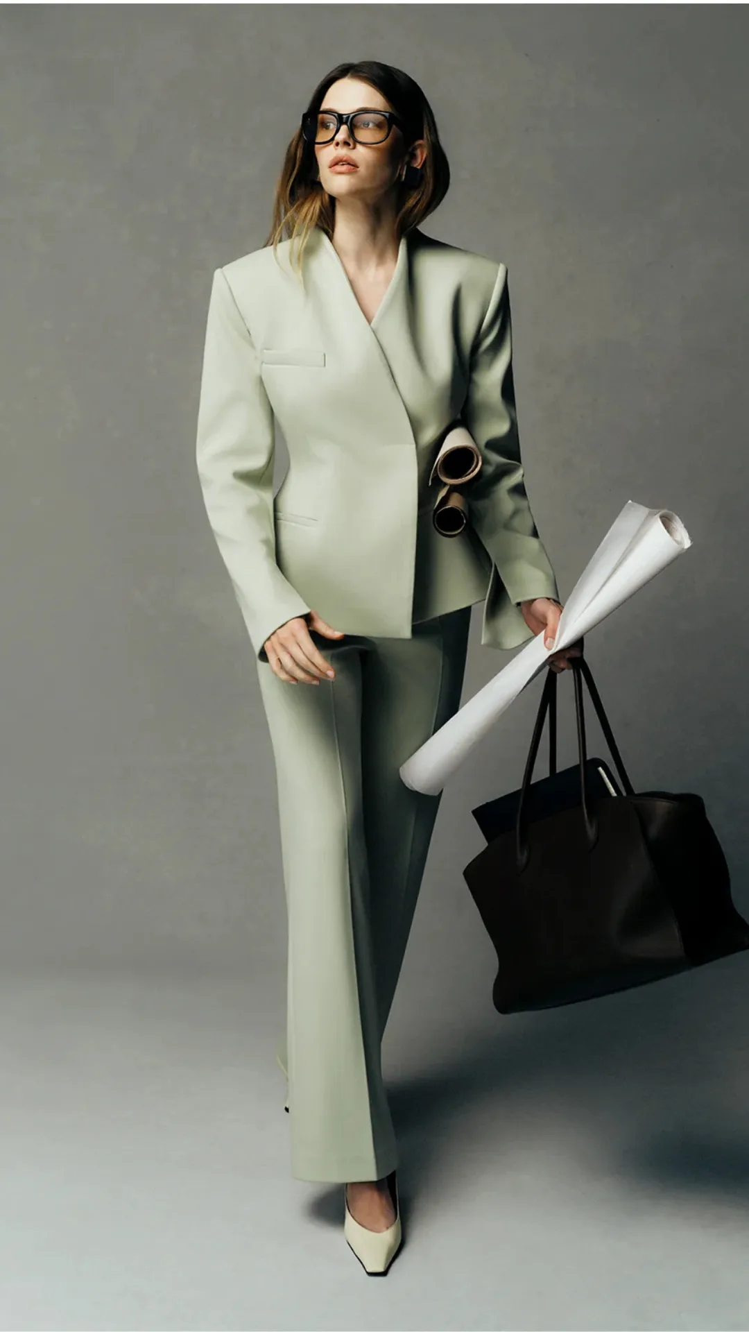 A model in a mint green suit