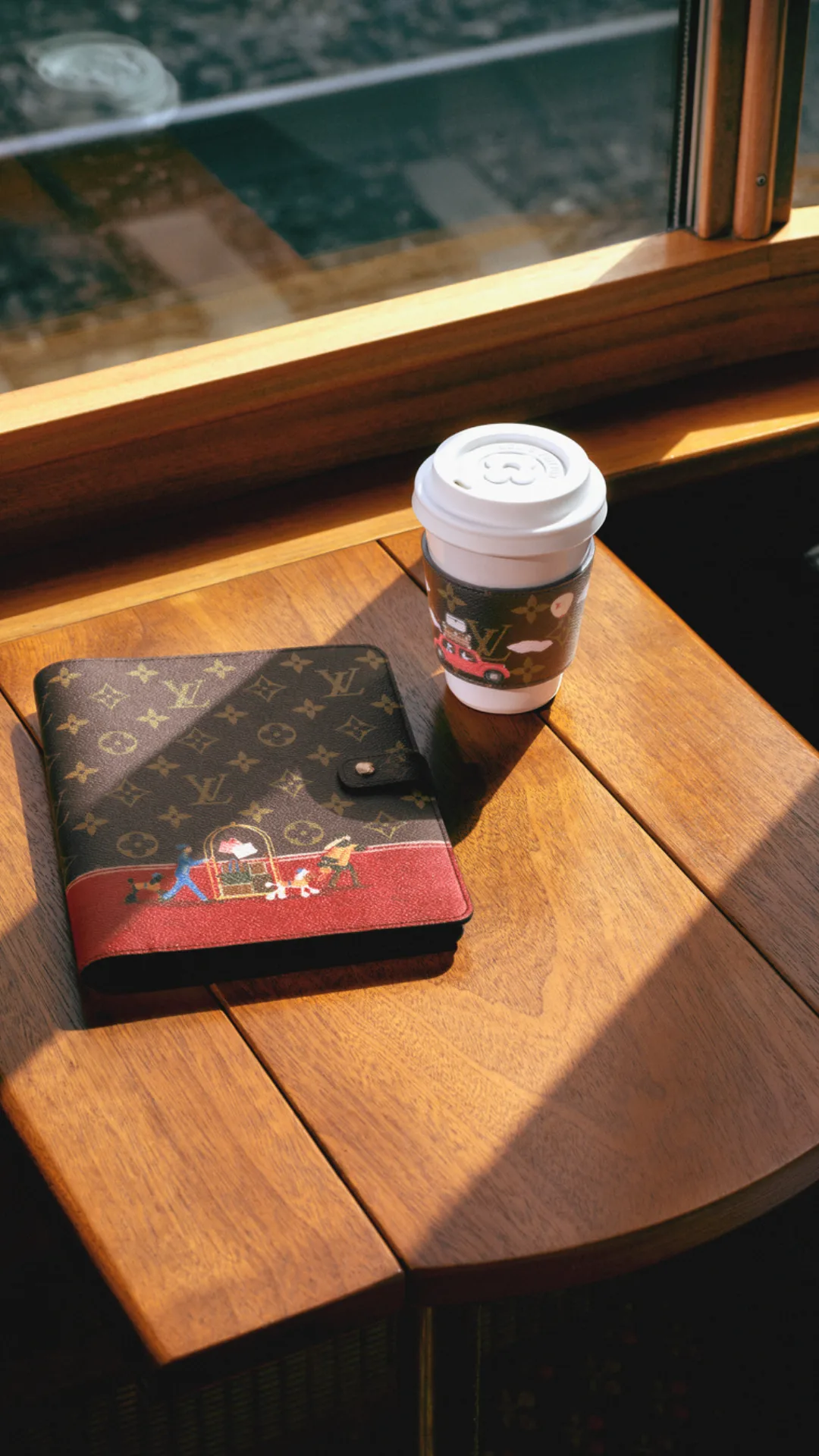 Louis Vuitton diary and coffee