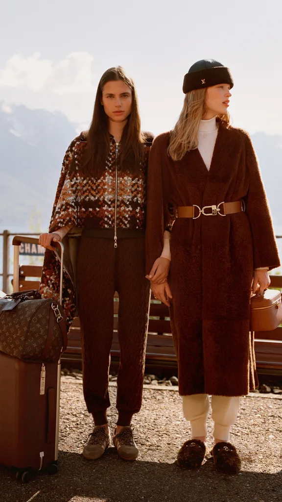 Two models wearing Louis Vuitton