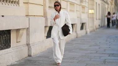 women in white linen suit
