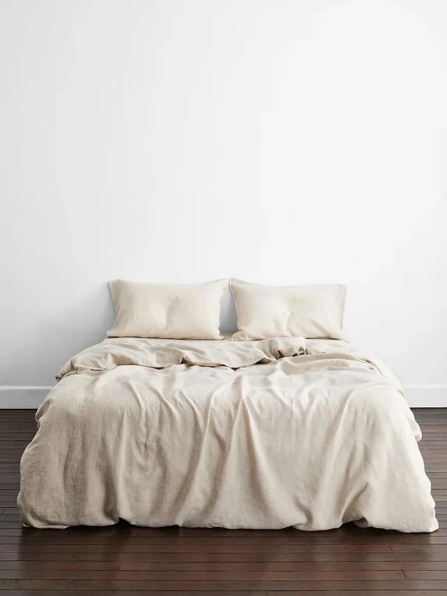 An oatmeal linen bed with pillowcases from Bed Threads