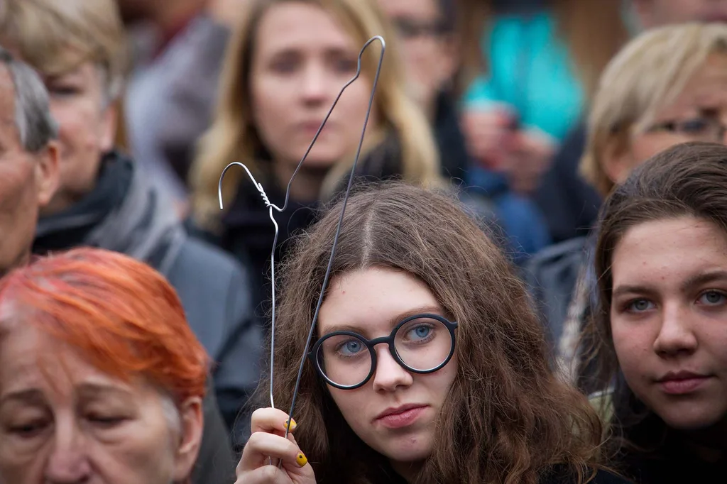 Protesters waved wire coat hangers, an item long associated with underground abortions.