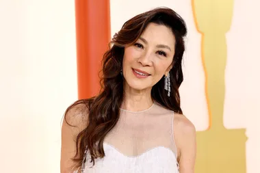 Michelle Yeoh Shines In A White Dior Gown On The 2023 Oscars Red Carpet