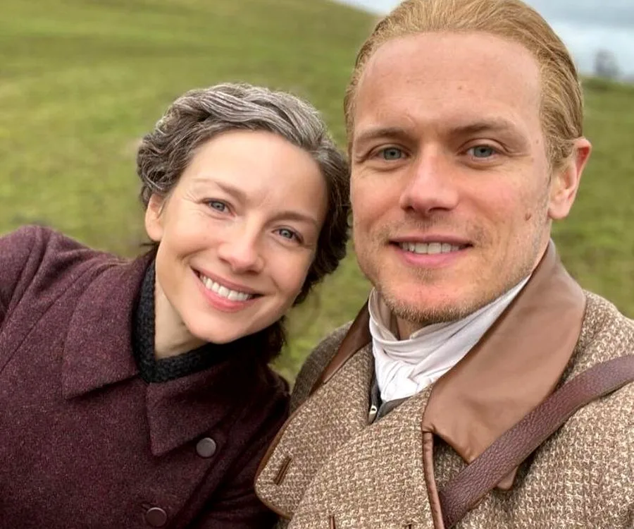 Sam Heughan dressed as Jamie Fraser and Caitriona Balfe as Claire Randall Fraser in 'Outlander'.