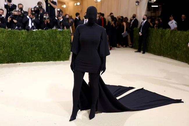 Kim Kardashian wears a balenciaga t shirt dress at the met gala